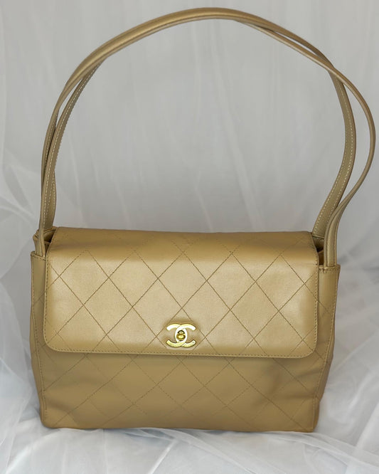 Chanel beige lambskin half flap bag