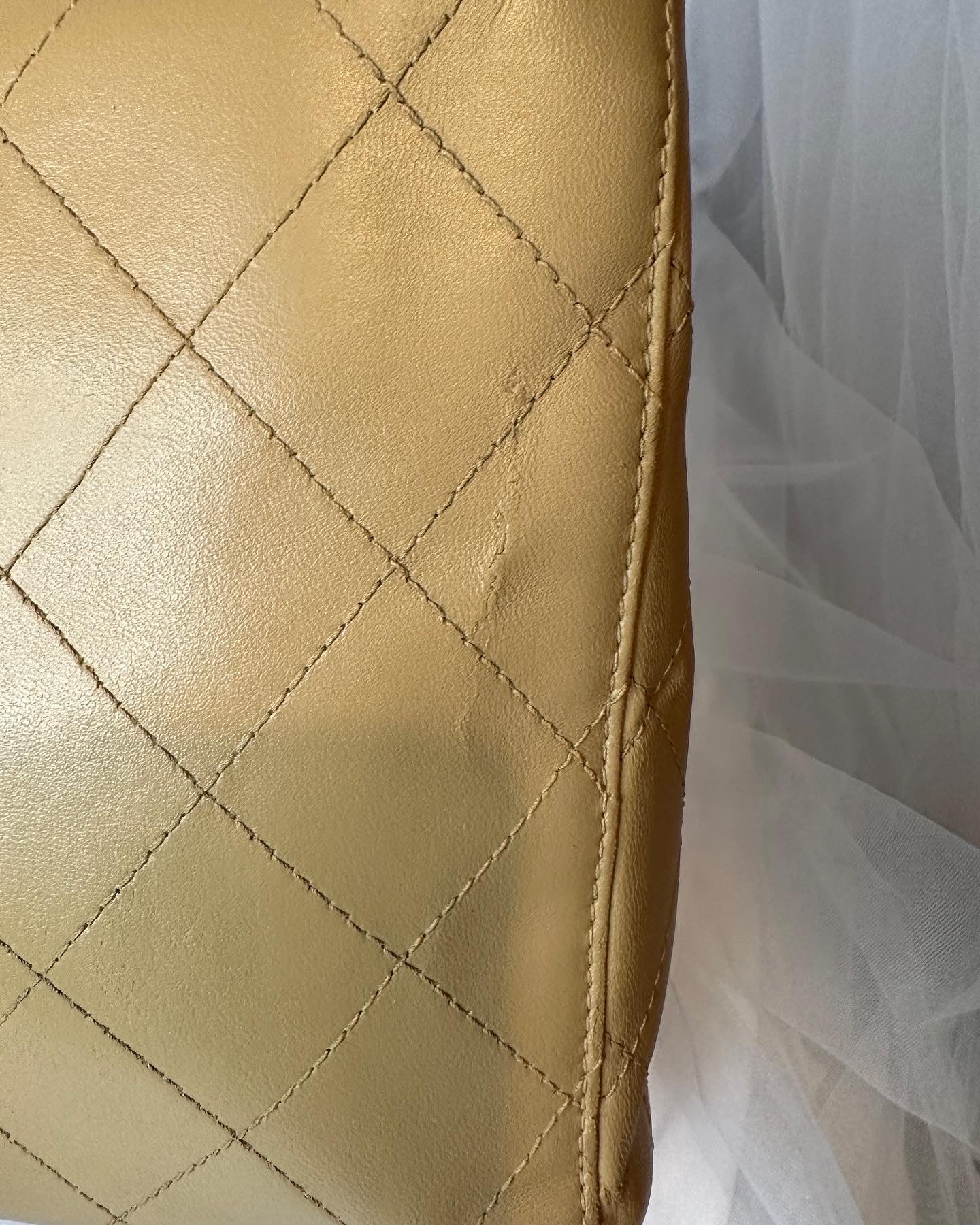 Chanel beige lambskin half flap bag