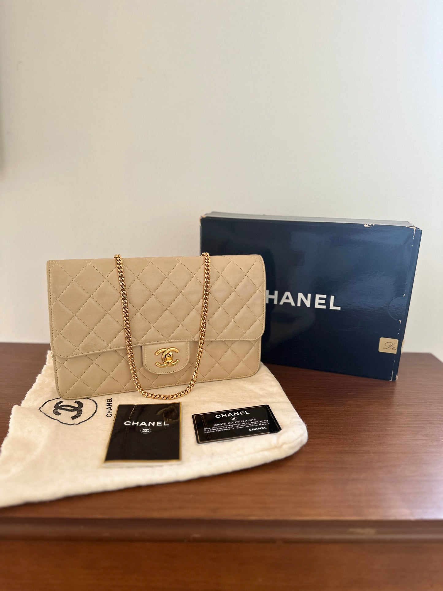 Chanel beige lambskin half flap single flap with gold hardware